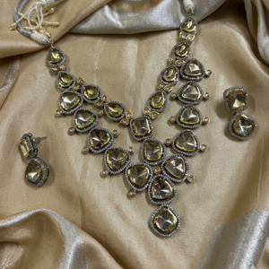 The Crystal Cascade: Grand Polki & Silver-Finish Tiered Set